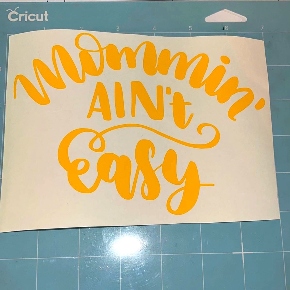 NEW yellow “mommin’ ain’t easy” decal